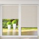 Roller blind in PVC cassette with a guide EX beige 74