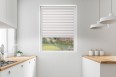 Roller blind in PVC cassette with a guide EX nude&white 76