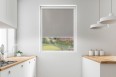 Blackout roller blind in PVC cassette with a guide gray 054