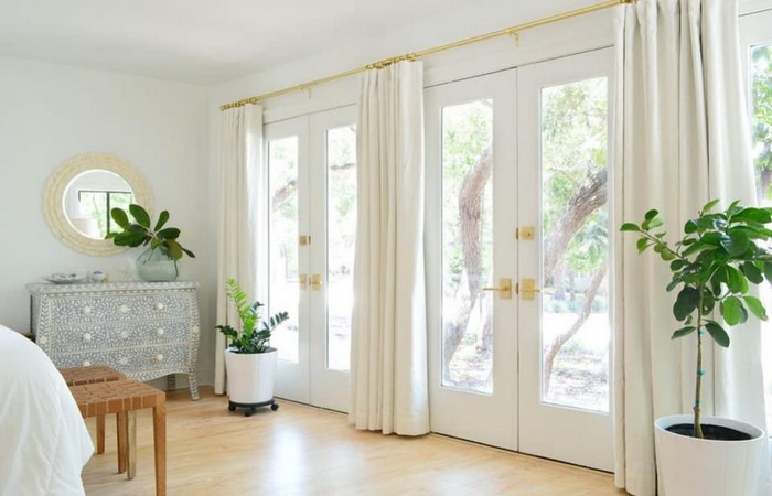 Jak dobrać karnisze do okna